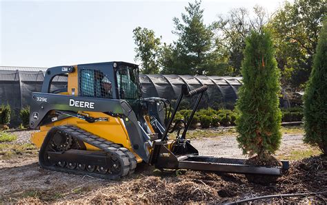 johnny deere skid steer with attachments|john deere compact equipment attachments.